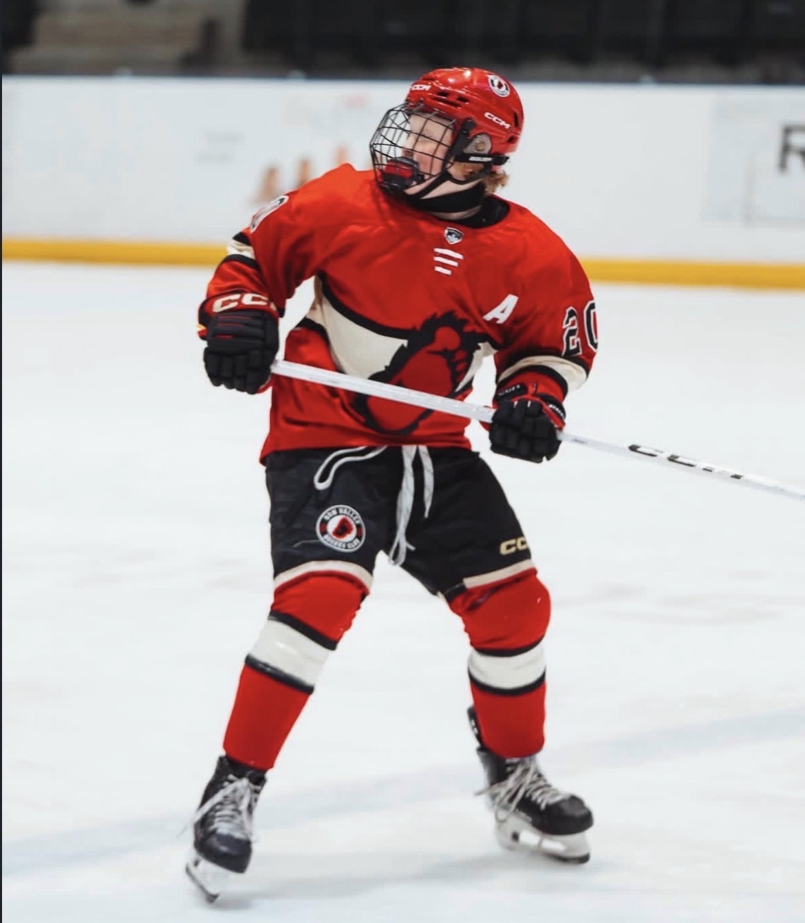 Jr. Bigfoot player in a red jersey on the ice